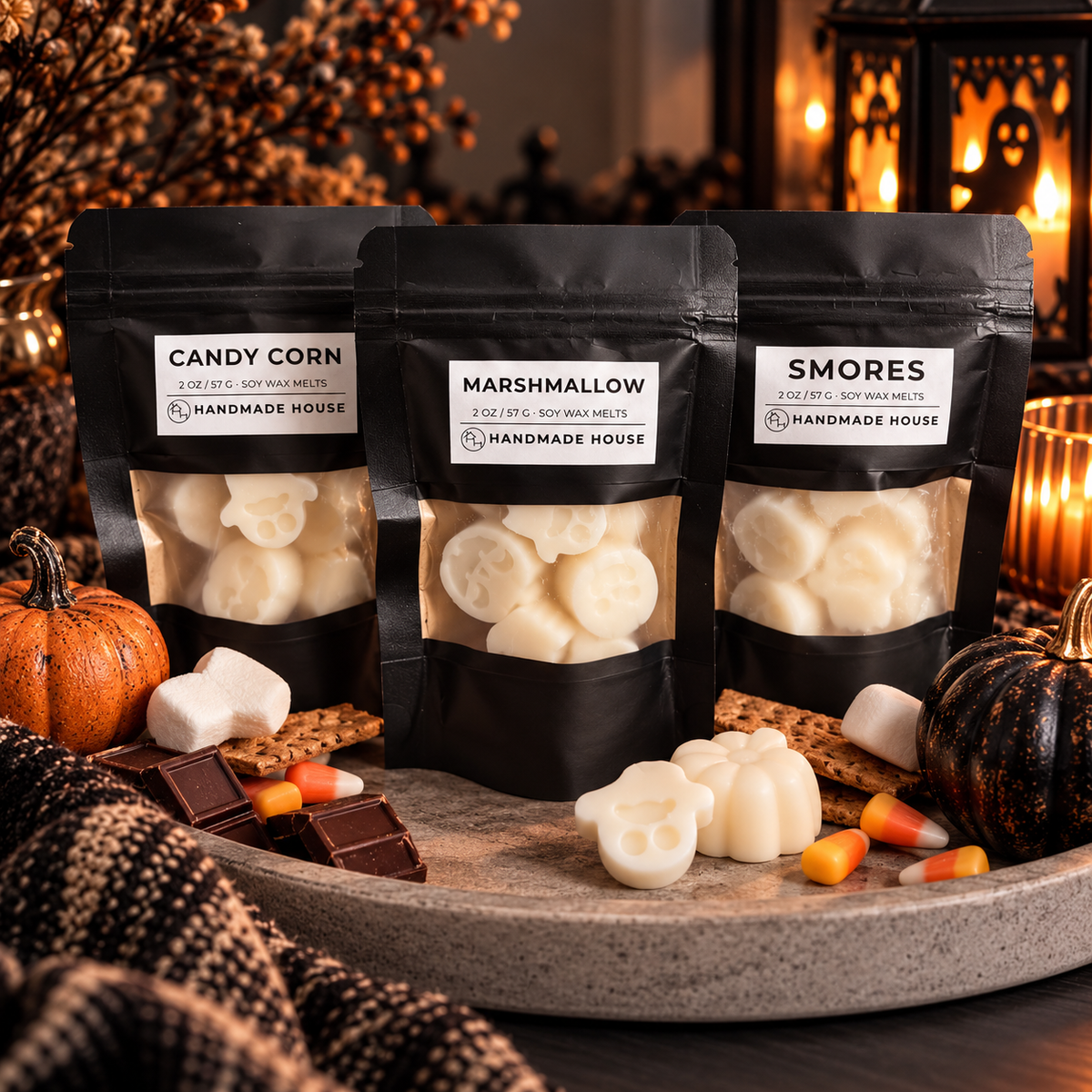 Candy Corn 2 oz soy wax melts beside pumpkin and skull-shaped melts