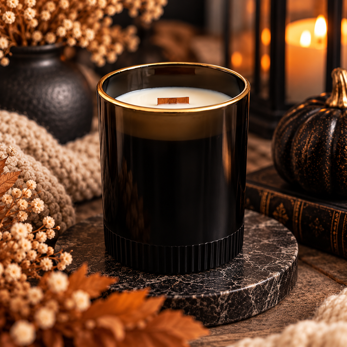 Black ribbed soy candle beneath a moonlit Halloween sky with pumpkins